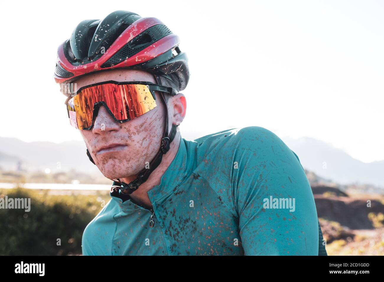 vibrant portrait of a dirty mountain biker Stock Photo
