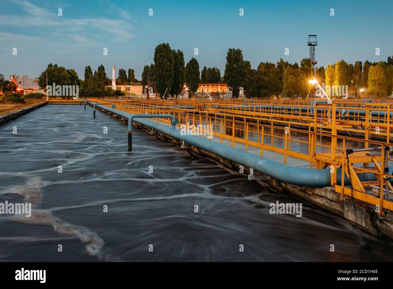 Modern wastewater treatment plant. Tanks for aeration and biological purification of sewage at night Stock Photo