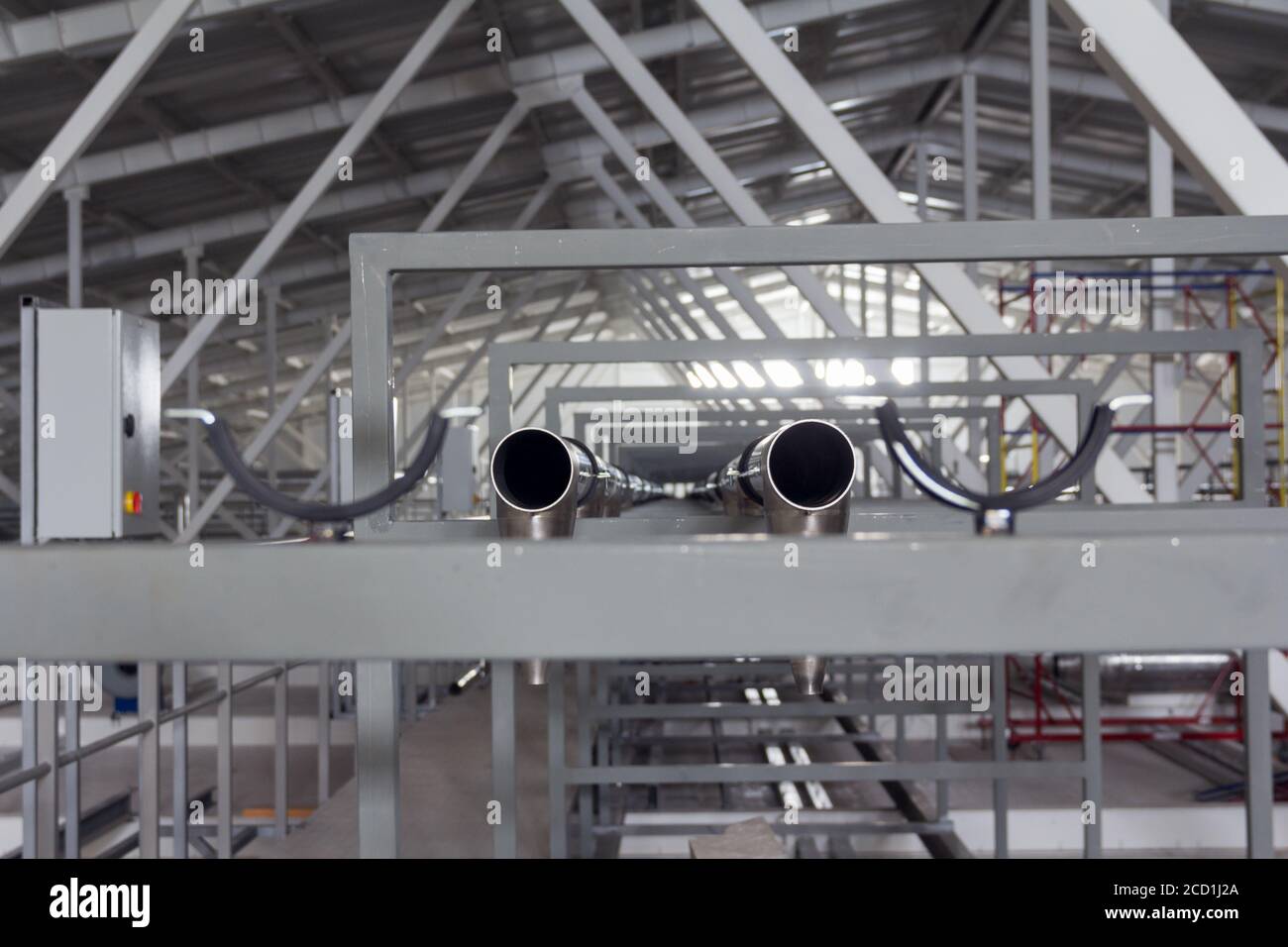 Installation of stainless steel pipes in a dairy. Milk pipes. Stainless