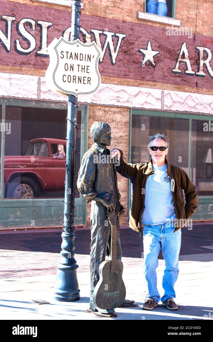 Man standing on the famous corner in Winslow off Route 66 Stock Photo