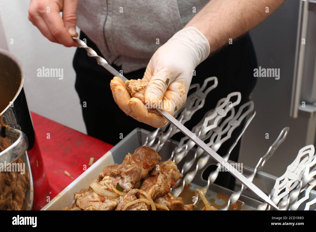 Putting sauce on meat hi-res stock photography and images - Alamy