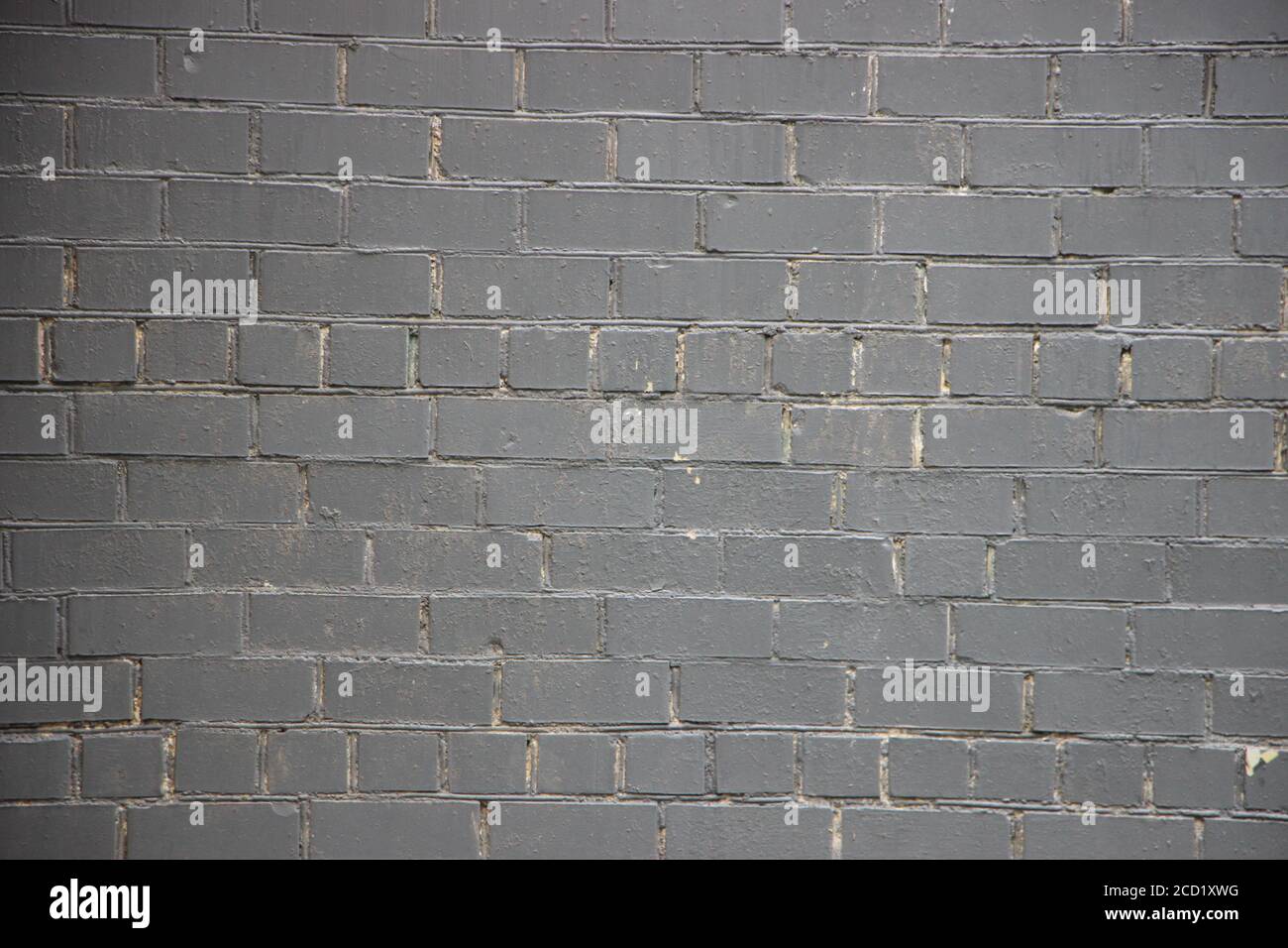 Black painted grunge brick wall background texture Stock Photo