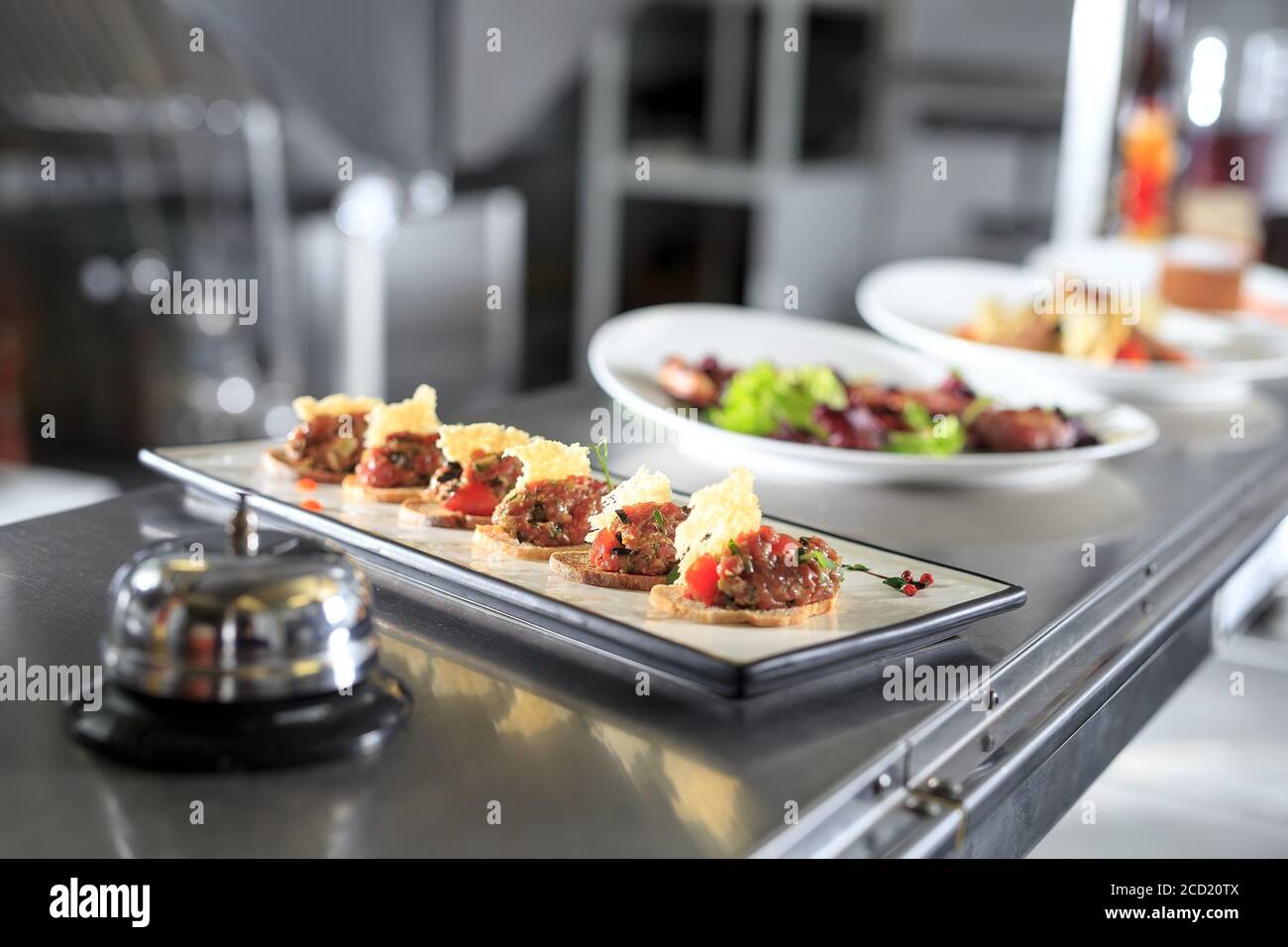 the distribution table in the kitchen of the restaurant Stock Photo Alamy