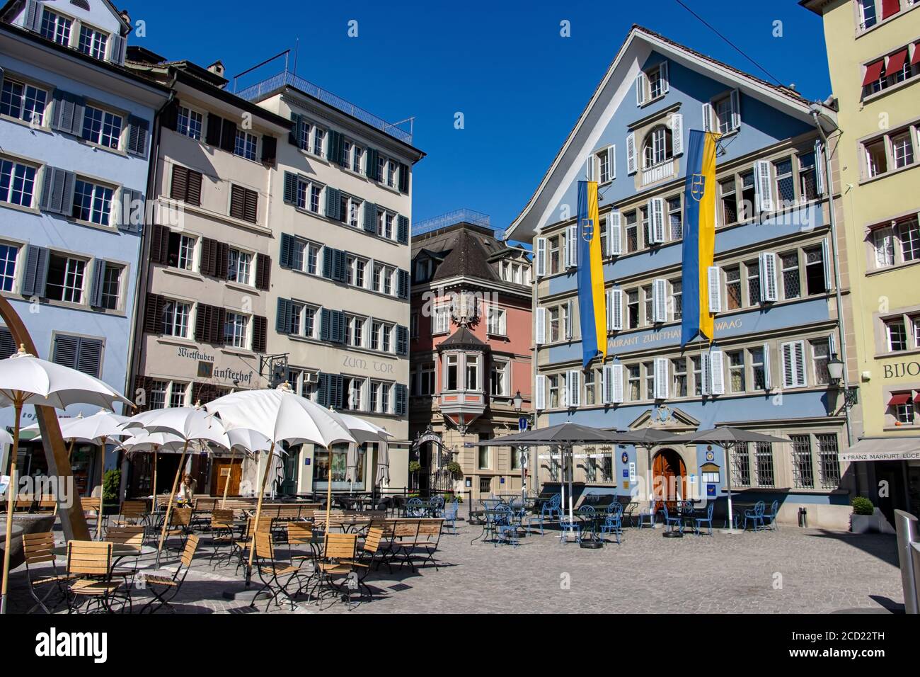 ZURICH, SWITZERLAND, JUL 30 2020, The historial square Munsterhof with the guild house Zunfthaus zur Waag in Zurich, Switzerland. Stock Photo