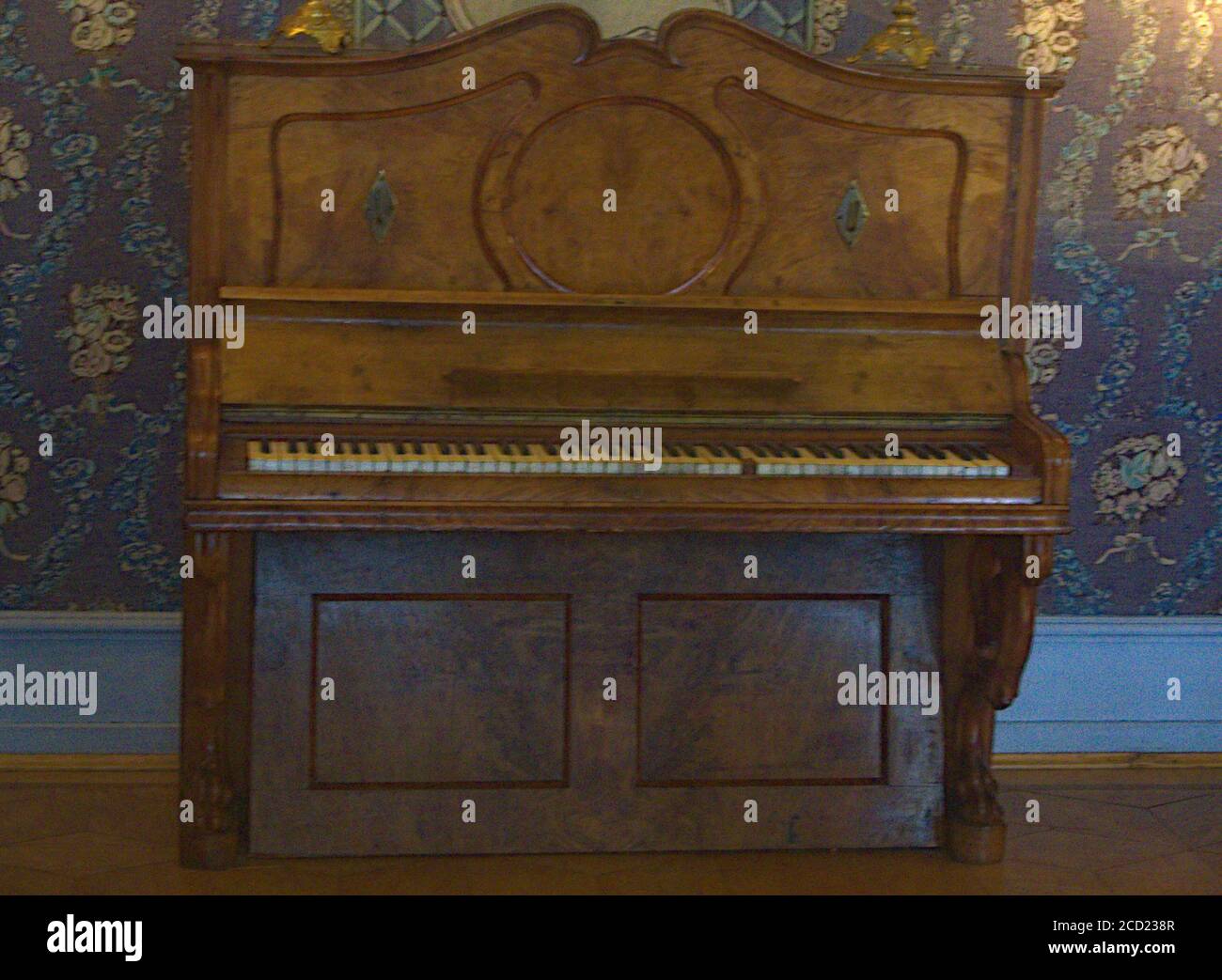 A really old wooden piano Stock Photo