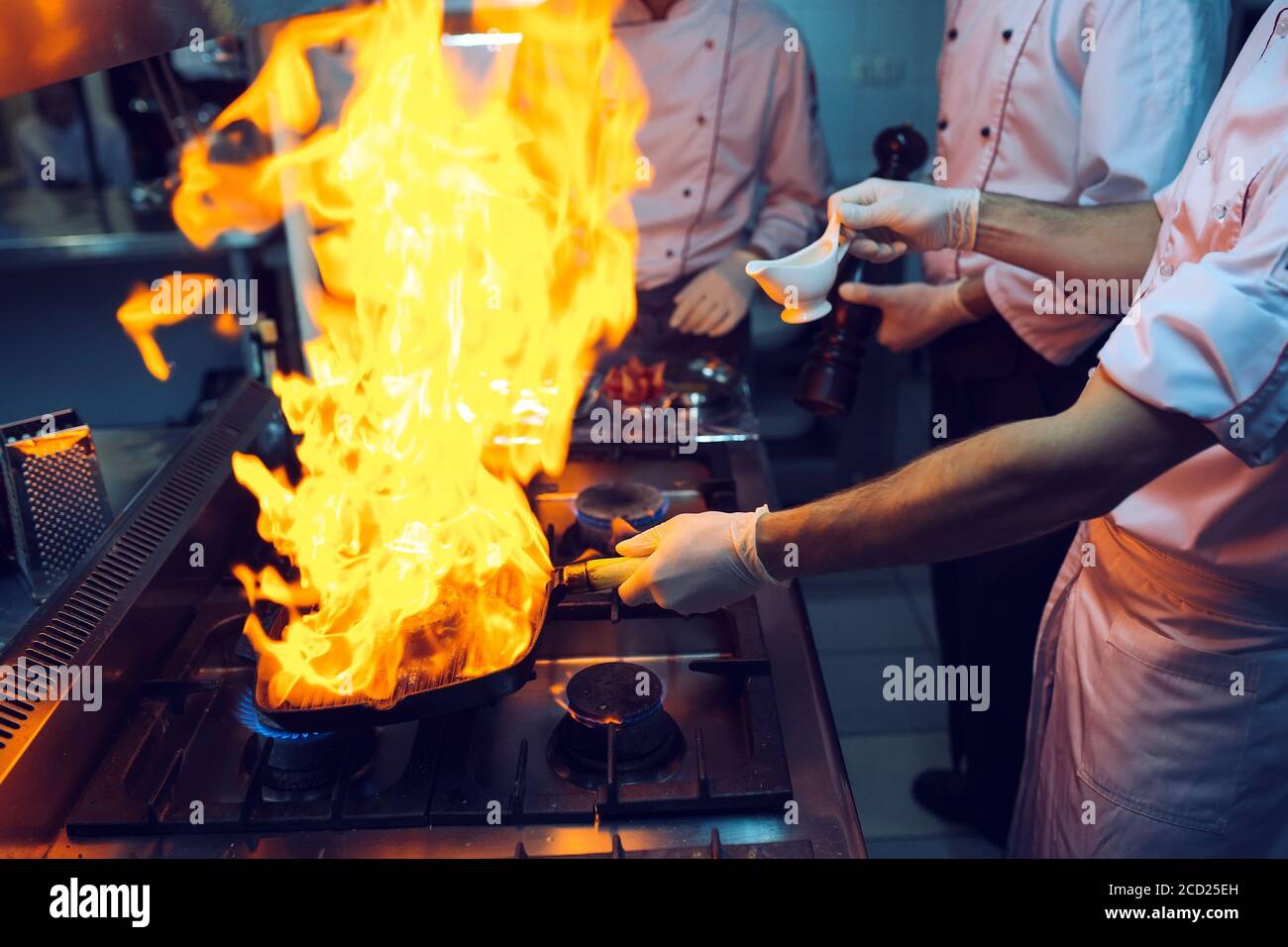 Fire in the kitchen. Fire gas burn is cooking on iron pan,stir fire