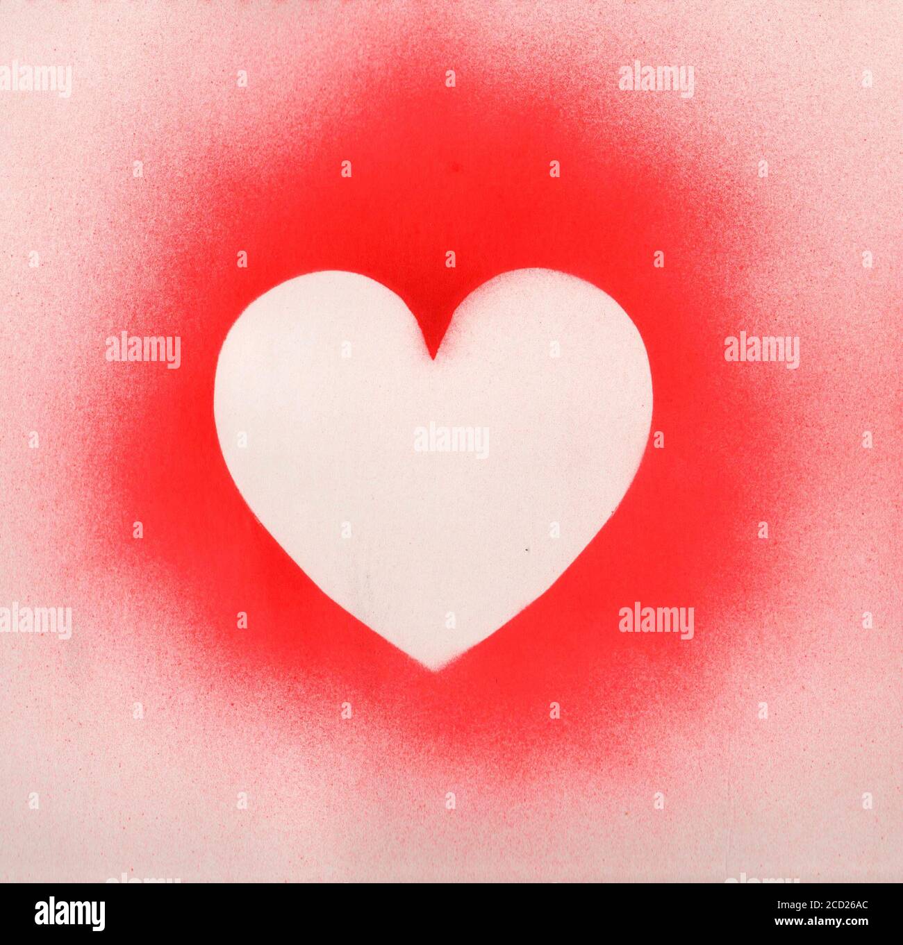 Spray paint heart sign, shape heart graffiti on white paper background