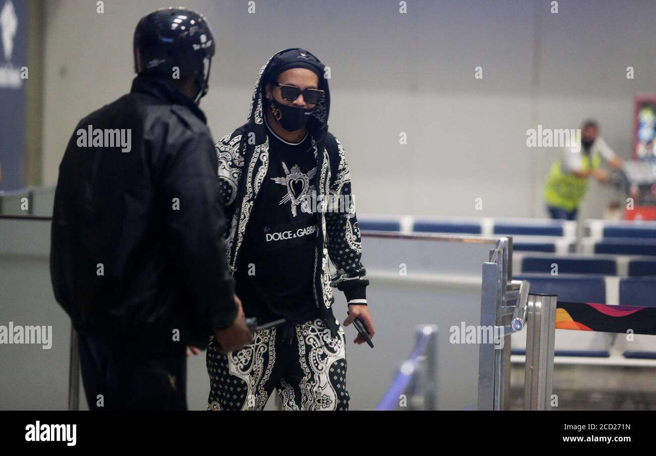 Rio de Janeiro,  Brazil  August 23,  Brazilian former soccer player Ronaldinho Gaucho arrives at Galeao airport arriving from Paraguay where was in prison Stock Photo