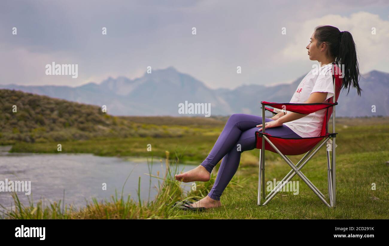 Camping chair woman hi-res stock photography and images - Alamy