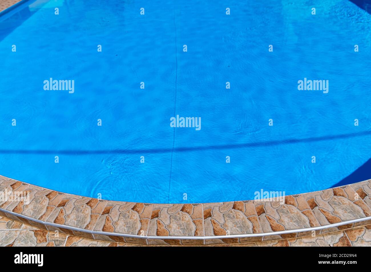 Modern outdoor luxurious swimming pool. Vacation concept Stock Photo