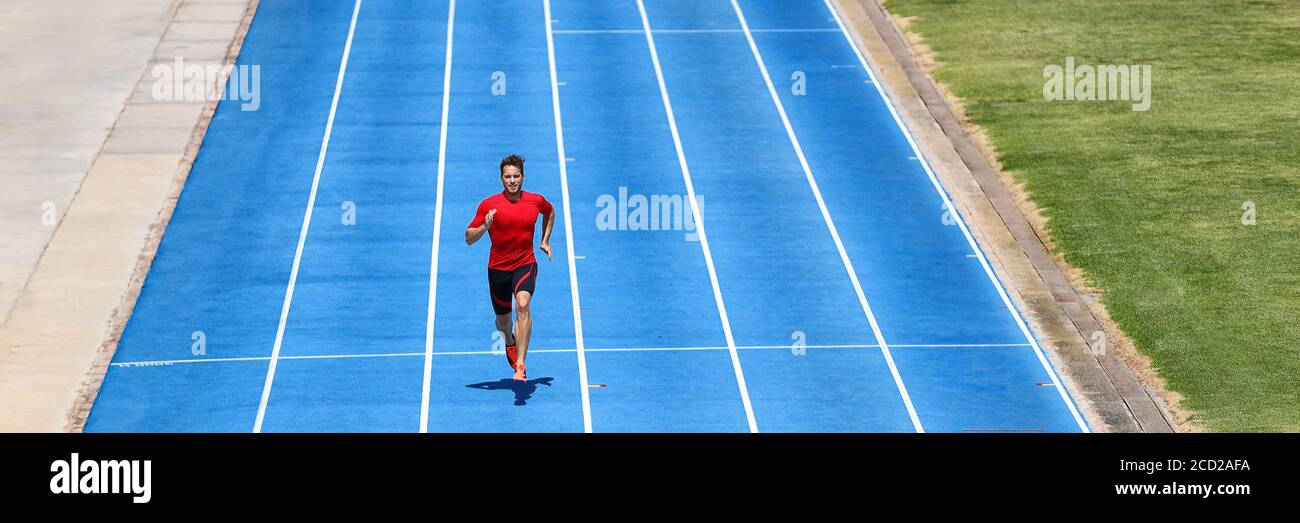 Running athlete runner sprinting on blue lanes. Track and field