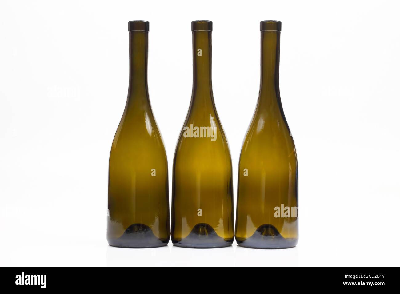 Three empty wine bottles on white background Stock Photo Alamy