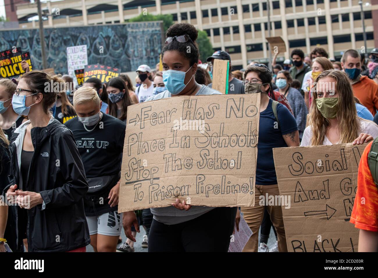 St. Paul, Minnesota. No police in our schools protest.  Protester marching with a fear has no place in our schools sign Stock Photo