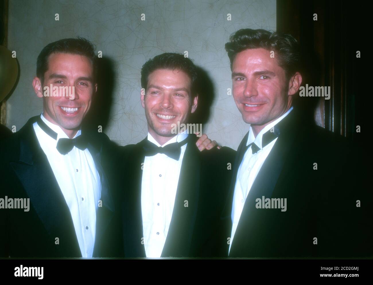 Century City, California, USA 10th March 1996 (L-R) Guest, actor Kevin Blair, aka Kevin Spirtas and Model/actor Dirk Shafer attend the Seventh Annual GLAAD Media Awards on March 10, 1996 at the Century Plaza Hotel in Century City, California, USA. Photo by Barry King/Alamy Stock Photo Stock Photo