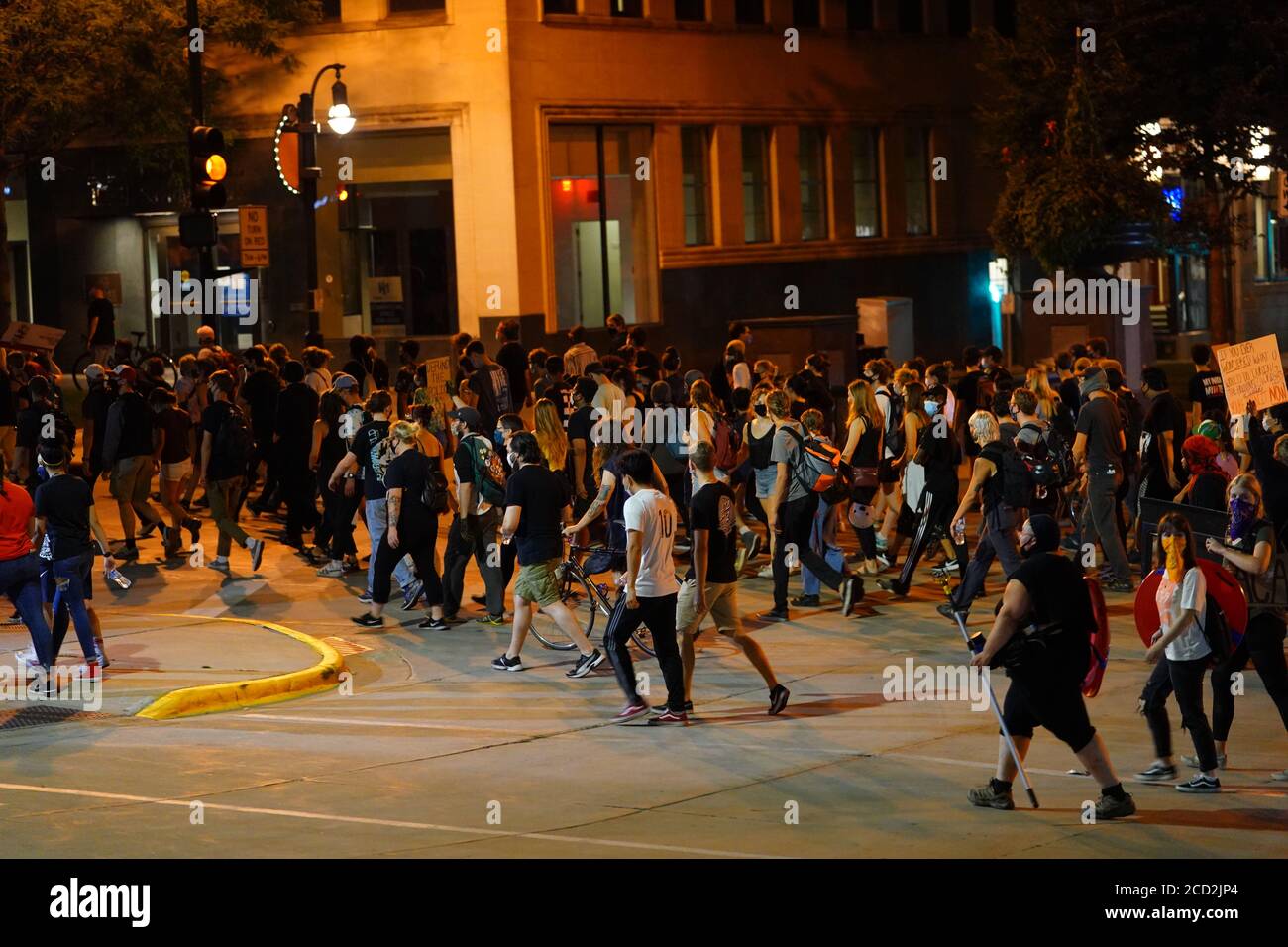 Rioters in the streets of wisconsin state capitol madison light fires ...