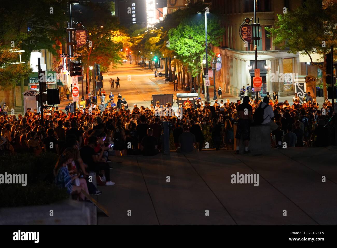 Rioters in the streets of wisconsin state capitol madison light fires ...