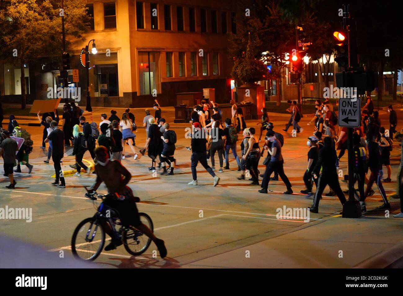 Rioters in the streets of wisconsin state capitol madison light fires ...