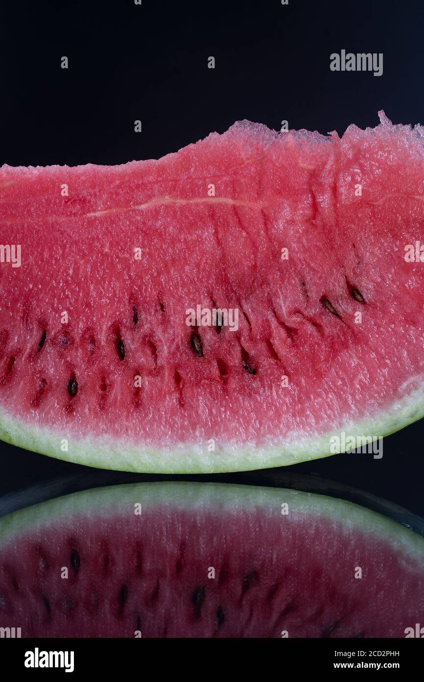 Watermelon slice on black hi-res stock photography and images - Alamy