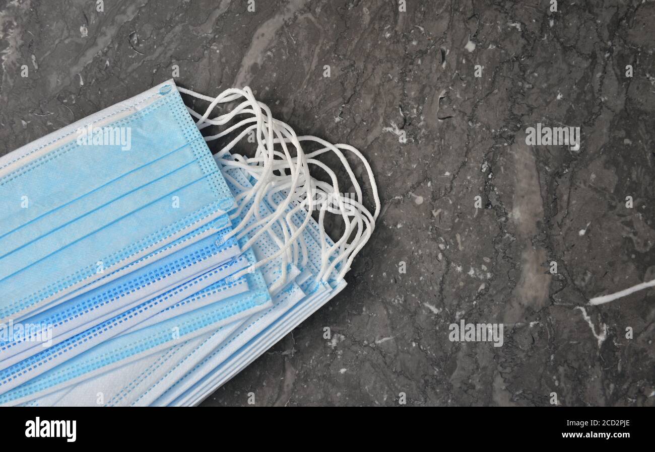 Pile blue surgical masks hi-res stock photography and images - Alamy