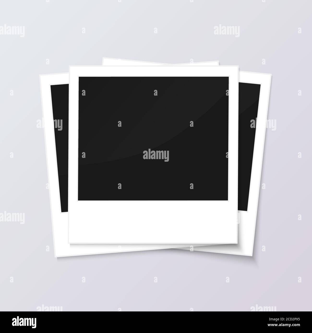 Stack of blank vintage paper photo frames from instant camera with