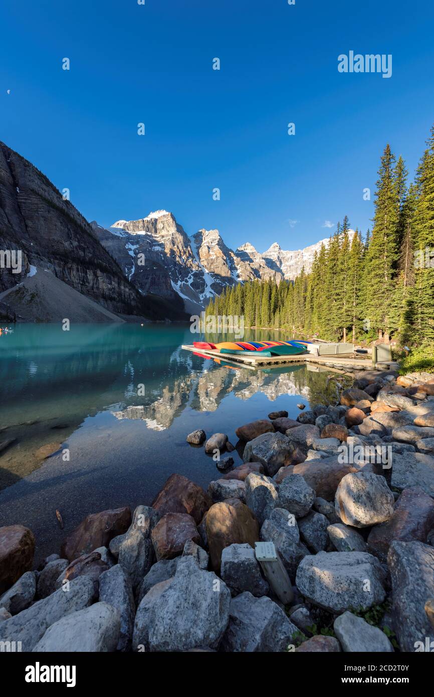 Moraine lake at sunrise in the Rocky Mountains, Alberta, Canada Stock ...