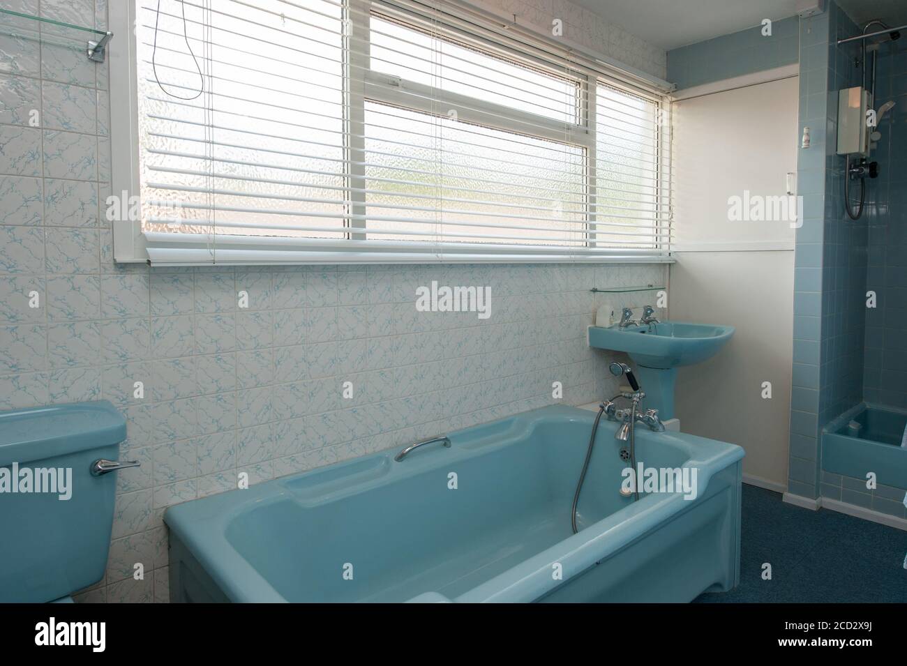 Old bathroom with outdated decor Stock Photo Alamy