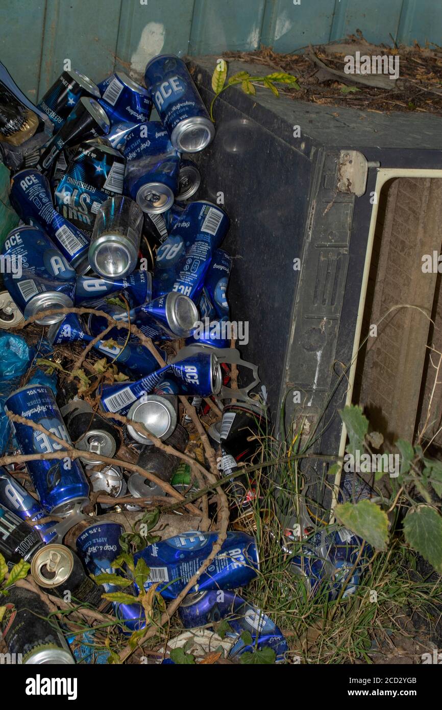 Rubbish unlawfully dumped in an urban alleyway displaying lack of