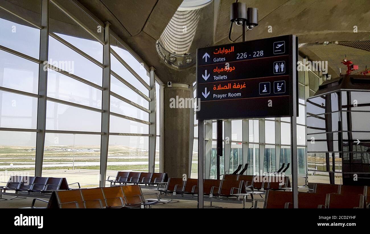 AMMAN, JORDAN - Mar 10, 2020: Empty gate seats at the airport of Amman in  Jordan with directional signboard to gates, toilets and prayer room. No  pass Stock Photo - Alamy