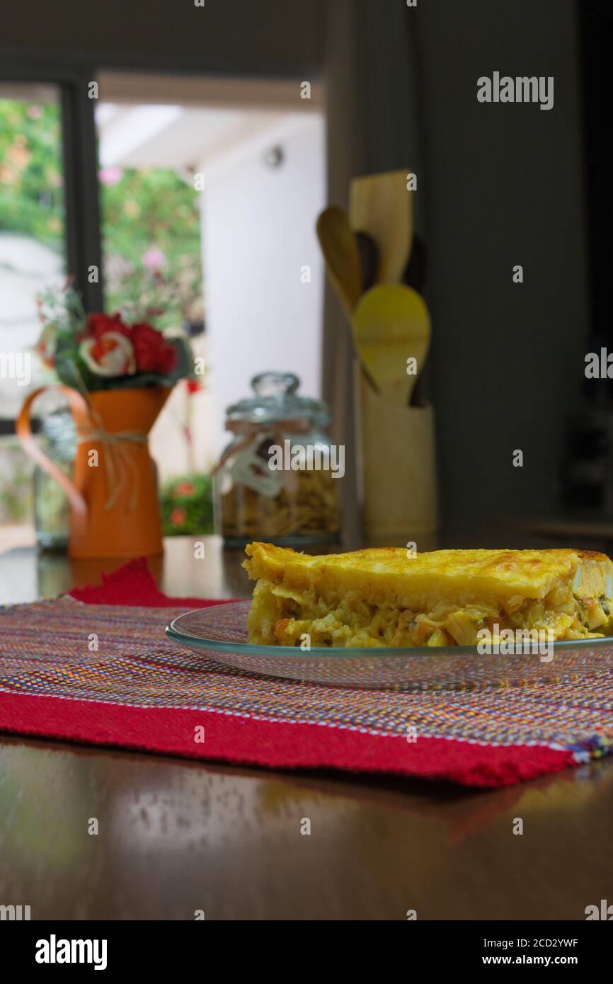 Traditional Russian sliced pie Kurnik close up on a slate board on the  table. vertical Stock Photo - Alamy