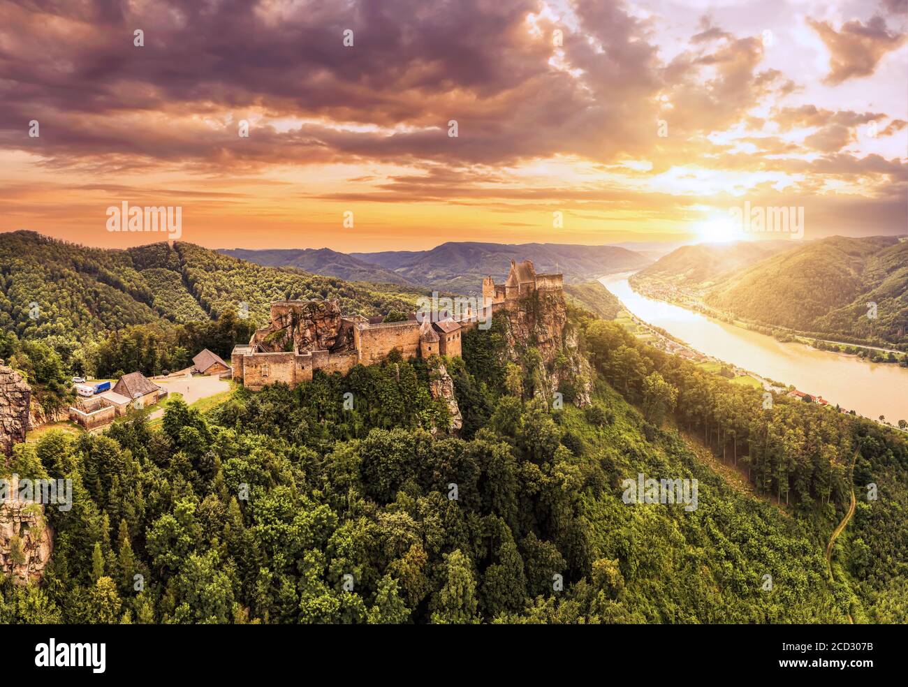 Beautiful landscape with Aggstein castle ruin and Danube river at sunset in Wachau walley Austria. Amazing historical ruins. Original german name is B Stock Photo