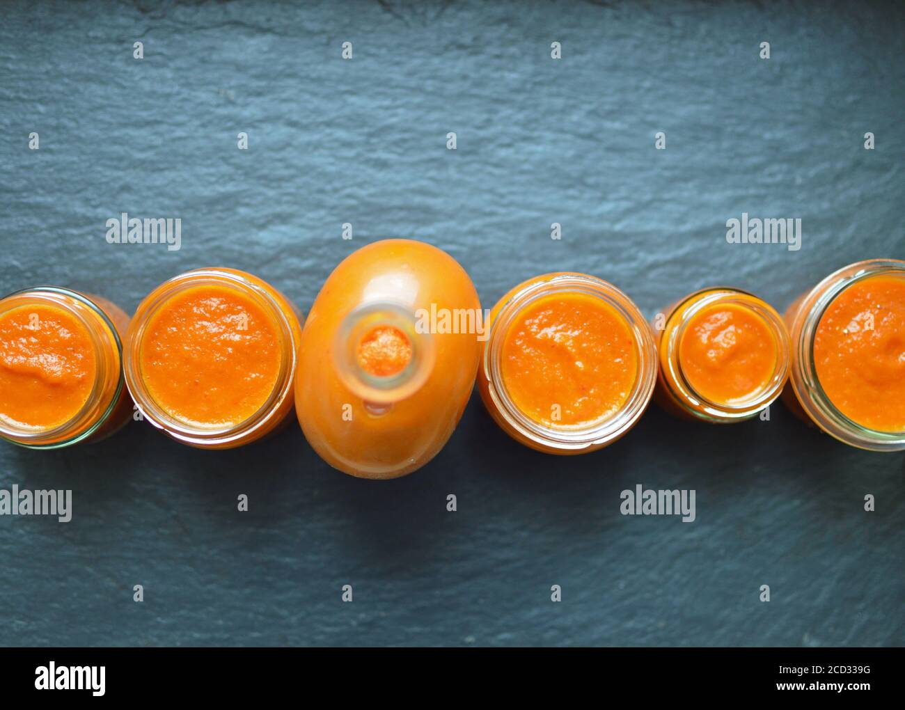 Top view of jars with chili sauce Stock Photo