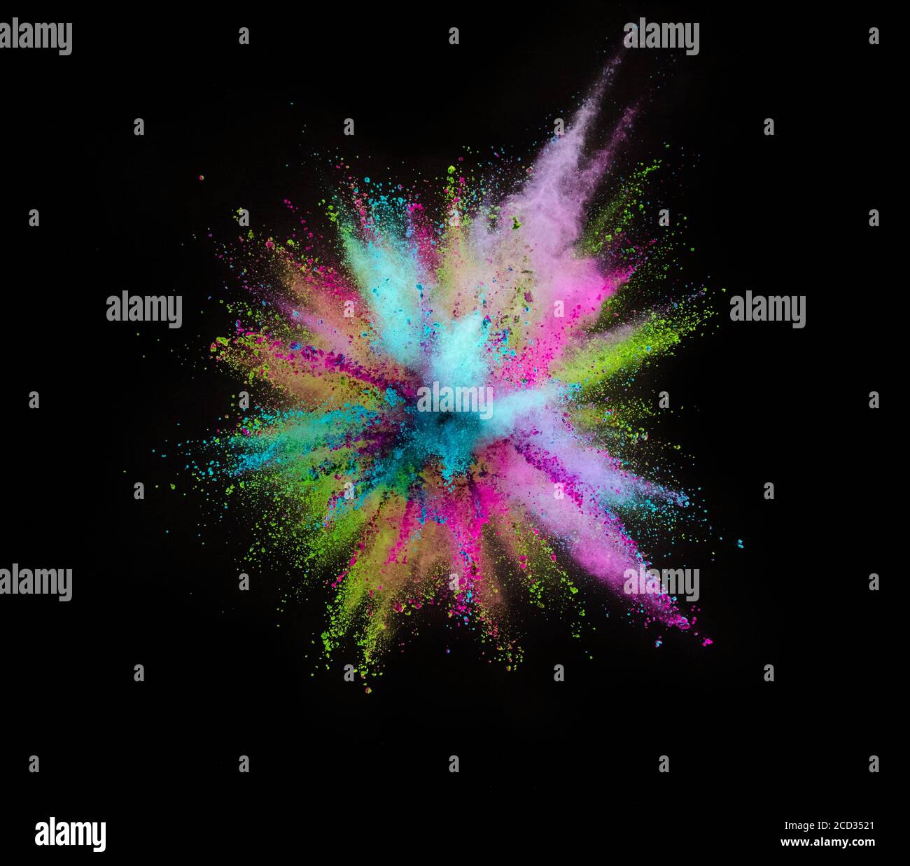 Colored powder explosion isolated on black background Stock Photo - Alamy