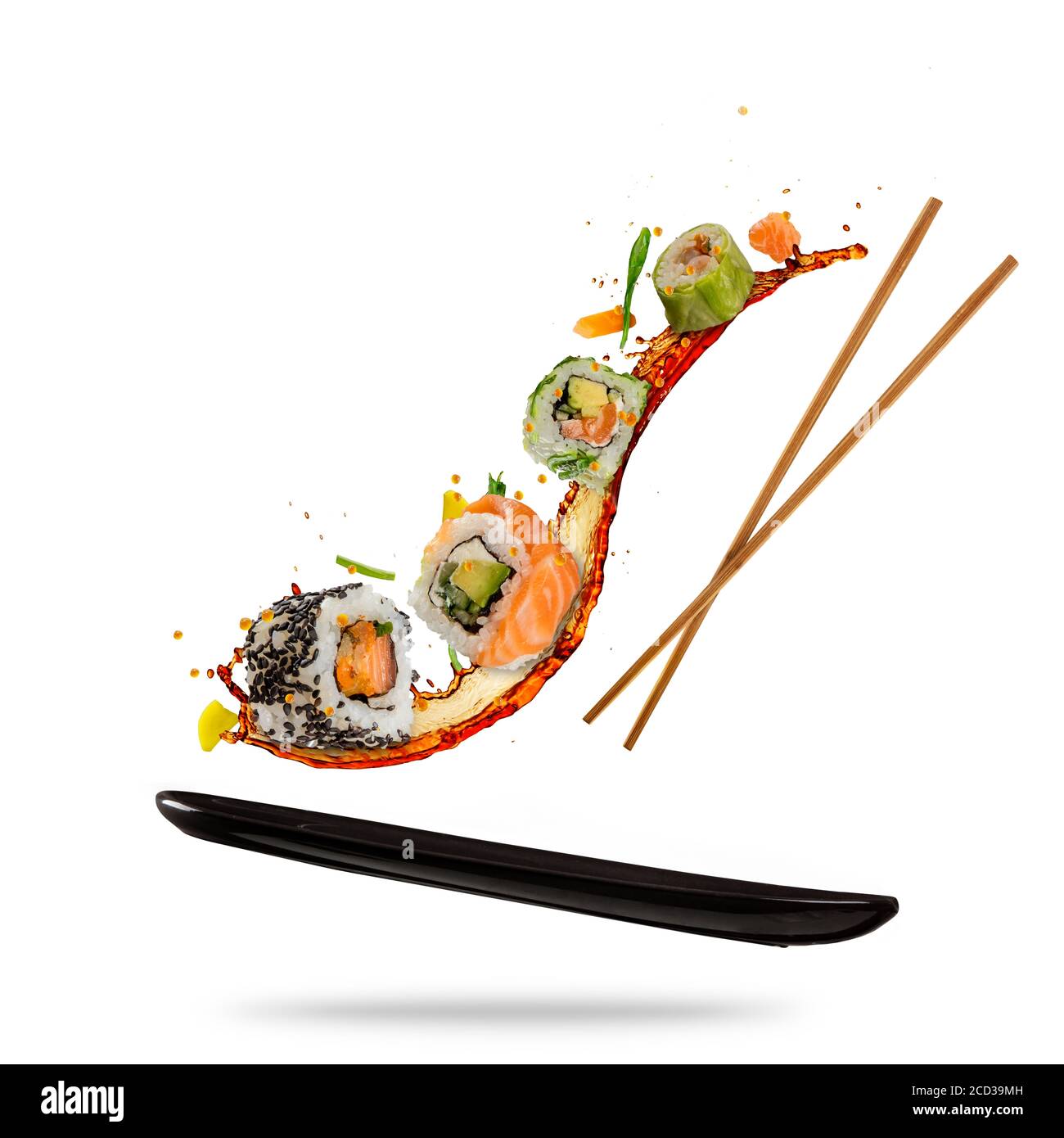 Flying sushi pieces isolated on white background. Concept of food levitation, high resolution image Stock Photo