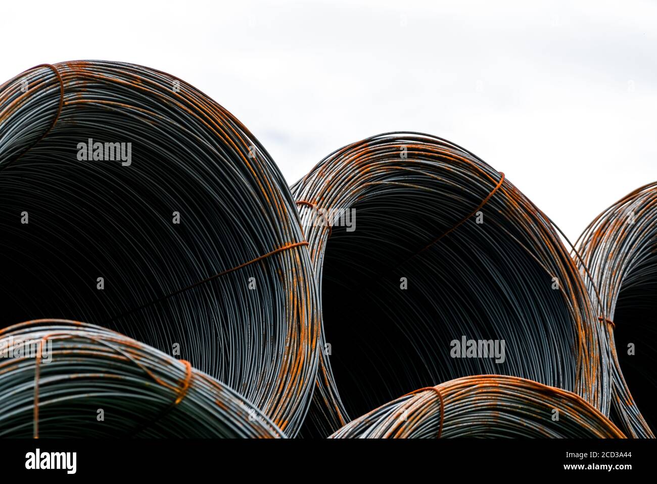 Steel wire coil isolated on white background. Metal steel reinforced