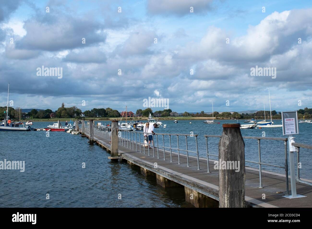 Jetty leading to the ferry which operate from Itchenor across the estuary. Stock Photo
