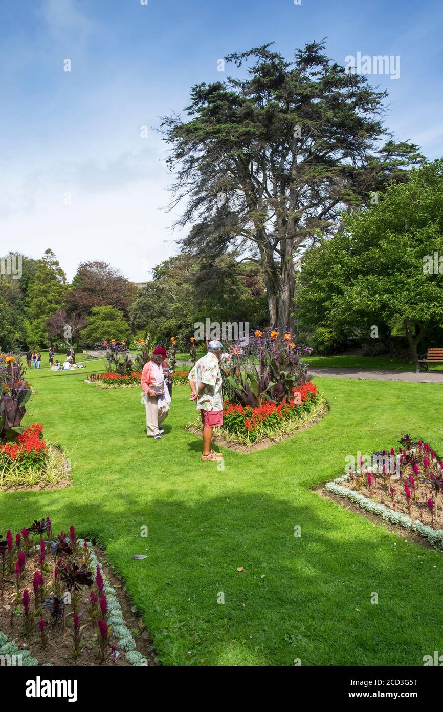 Visitors enjoying the landscaped sub tropical Trenance Gardens in Newquay in Cornwall. Stock Photo