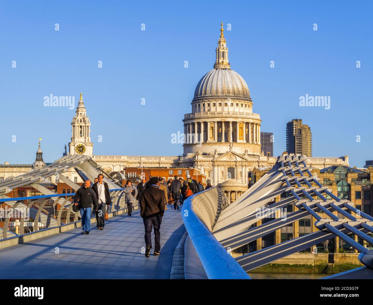 View from the south over Millennium Bridge to the north bank of the Embankment and the dome of St Paul's Cathedral, City of London Stock Photo