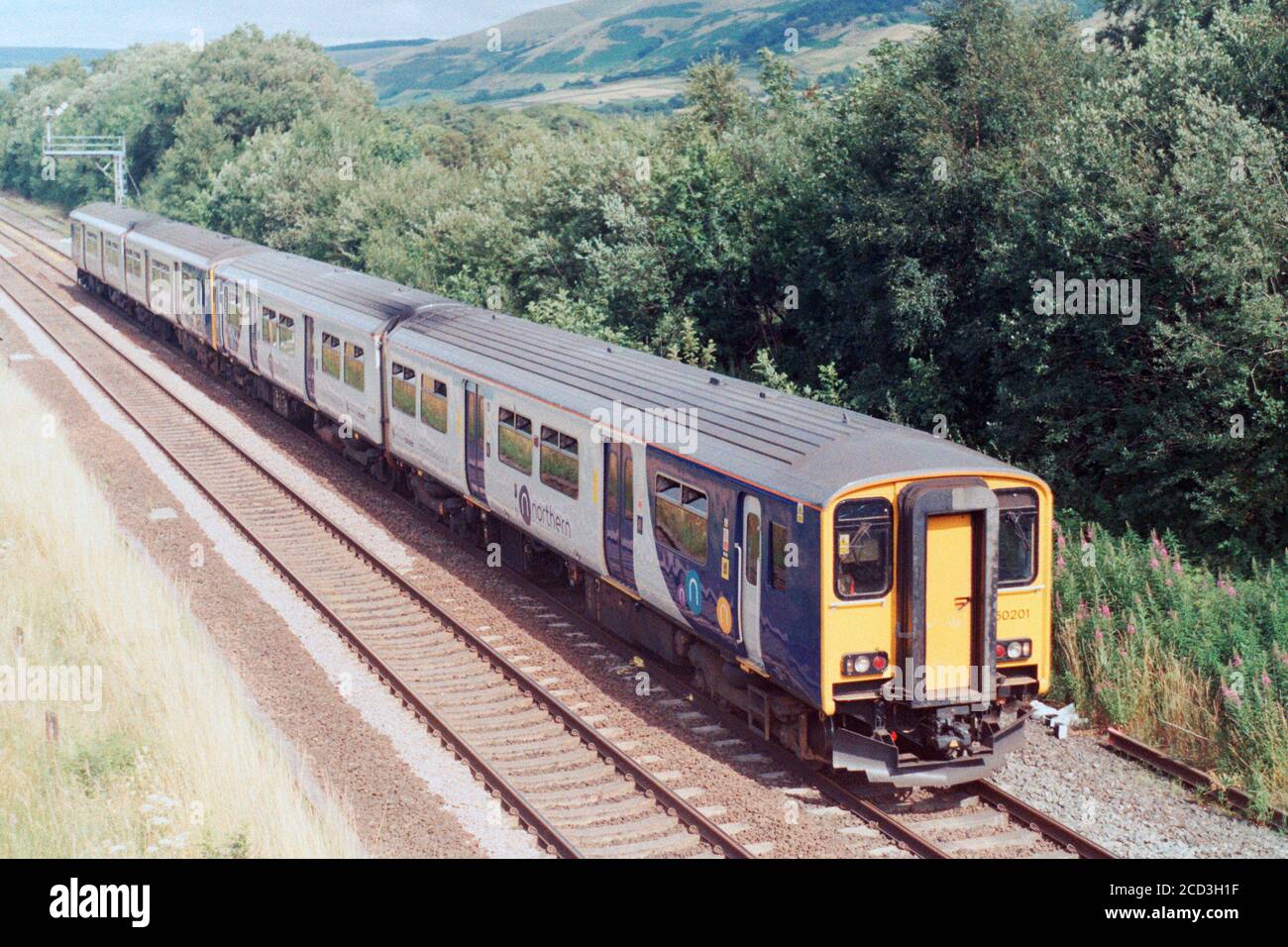 Edale, UK - 1 August 2020: A Northern passenger train through Edale to Manchester direction. Stock Photo