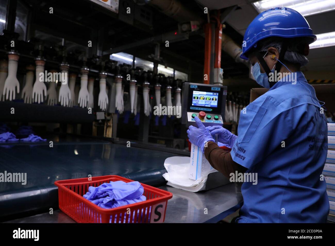 A Worker Works At A Production Line In Top Glove Factory In Shah Alam Malaysia August 26 2020 Reuters Lim Huey Teng Stock Photo Alamy