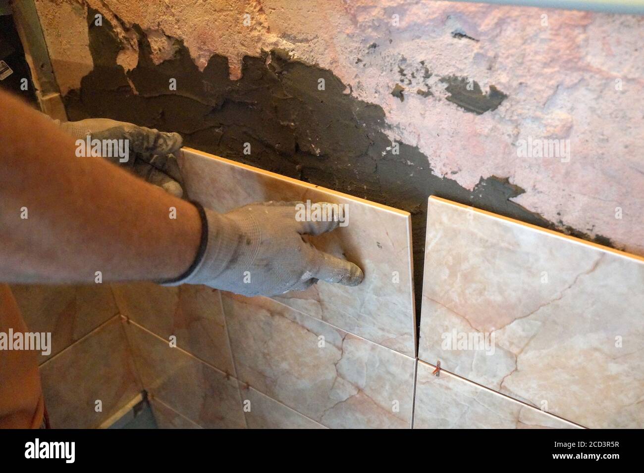 Worker bathroom tiles man tiling tool hi-res stock photography and ...