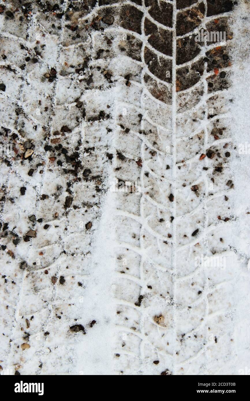 Tire marks in snow Stock Photo Alamy