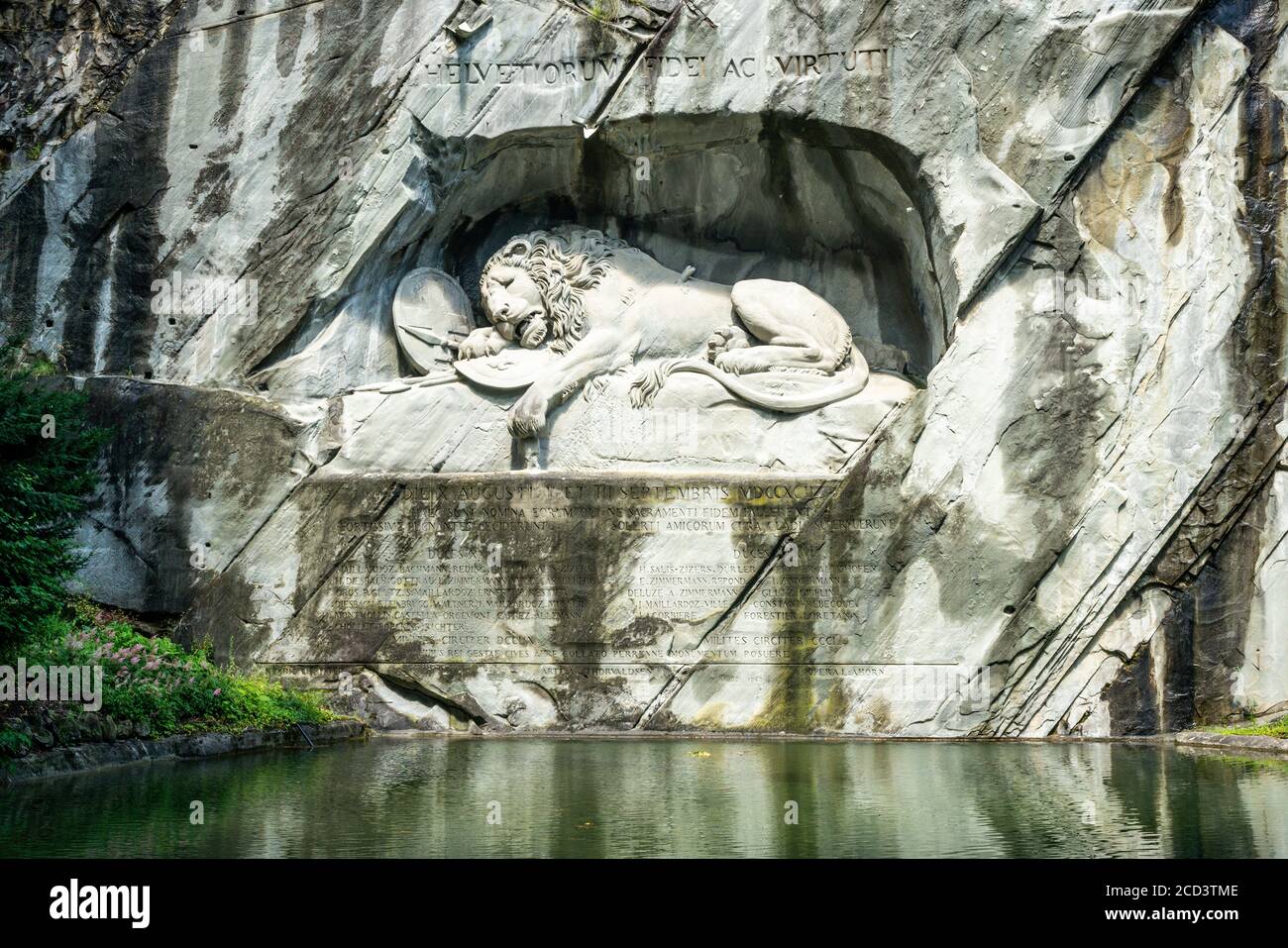 Scenic view of the Lucerne Lion monument carving and pool symbol of Lucerne city Switzerland ( translation : To the loyalty and bravery of the Swiss ) Stock Photo