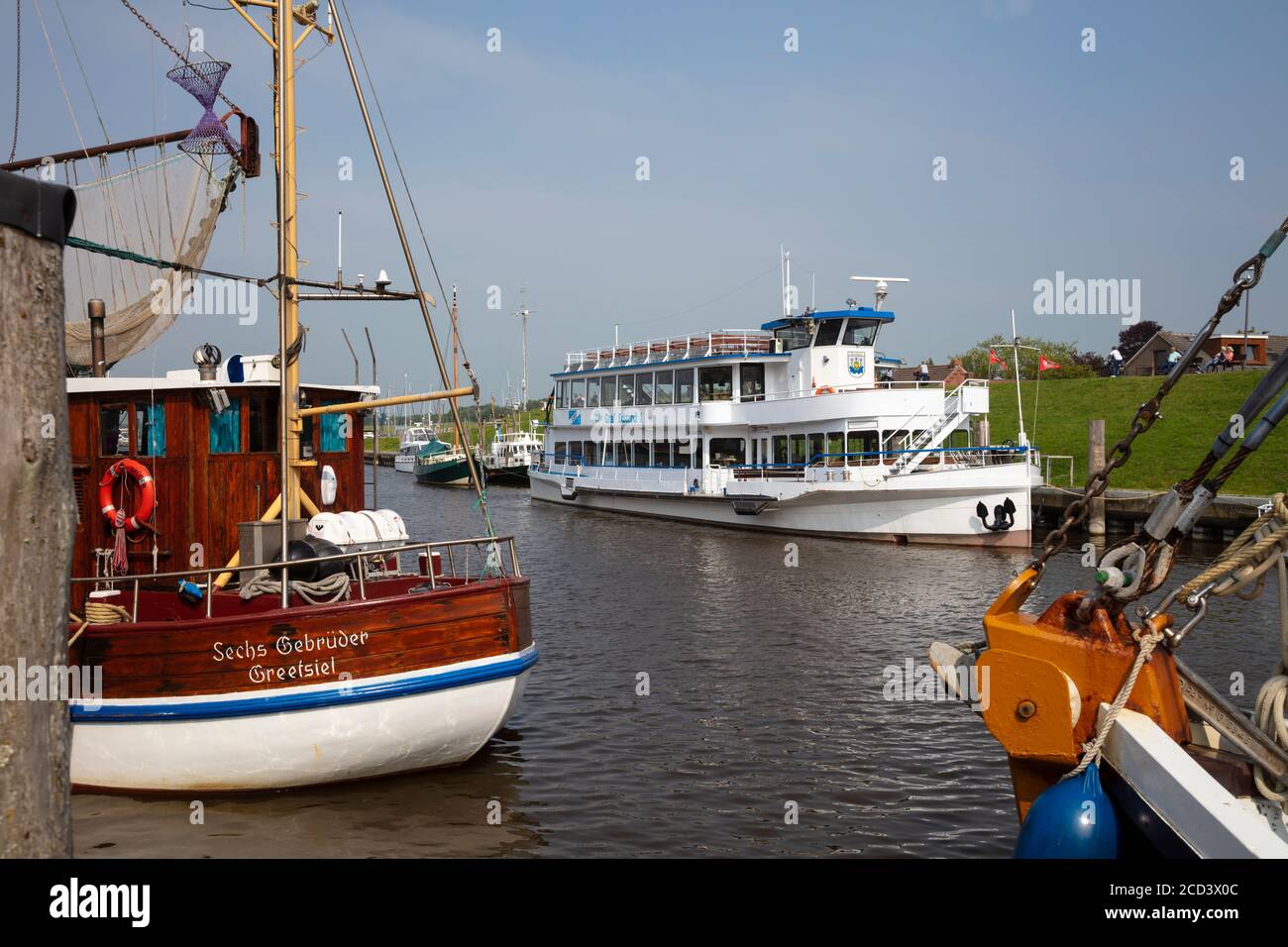 Fishing ship at the harbor of Greetsiel, Krummhörn, East Frisia, Lower saxony, Germay, Europe Stock Photo