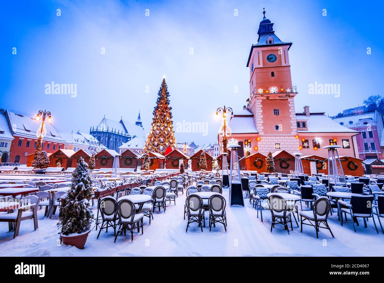 Christmas market and decorations tree downtown of Brasov, winter season in Transylvania, Romania. Stock Photo