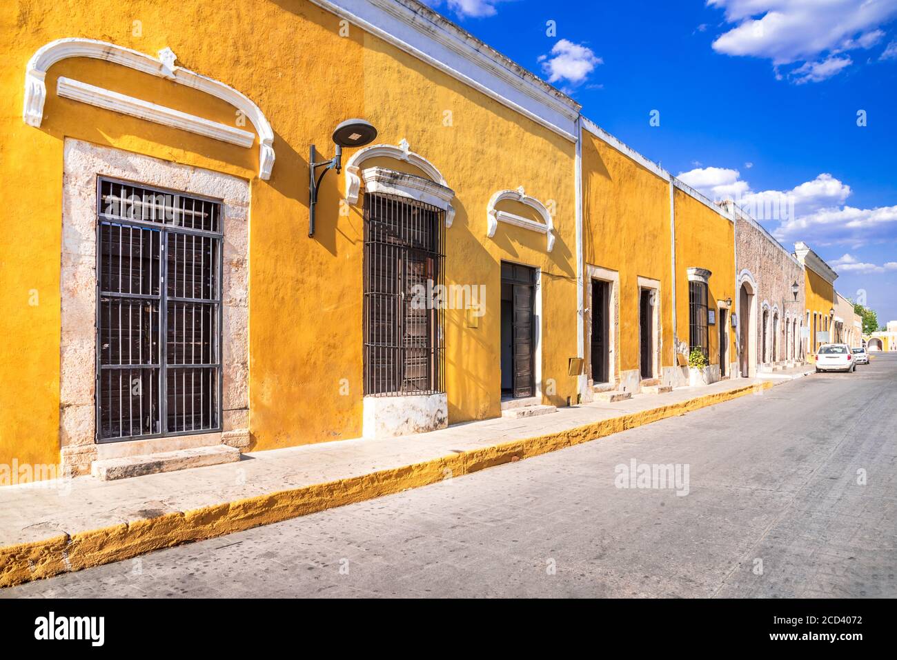Izamal, Mexico. Spanish colonial downtown street in Yellow City, Yucatan Peninsula. Stock Photo