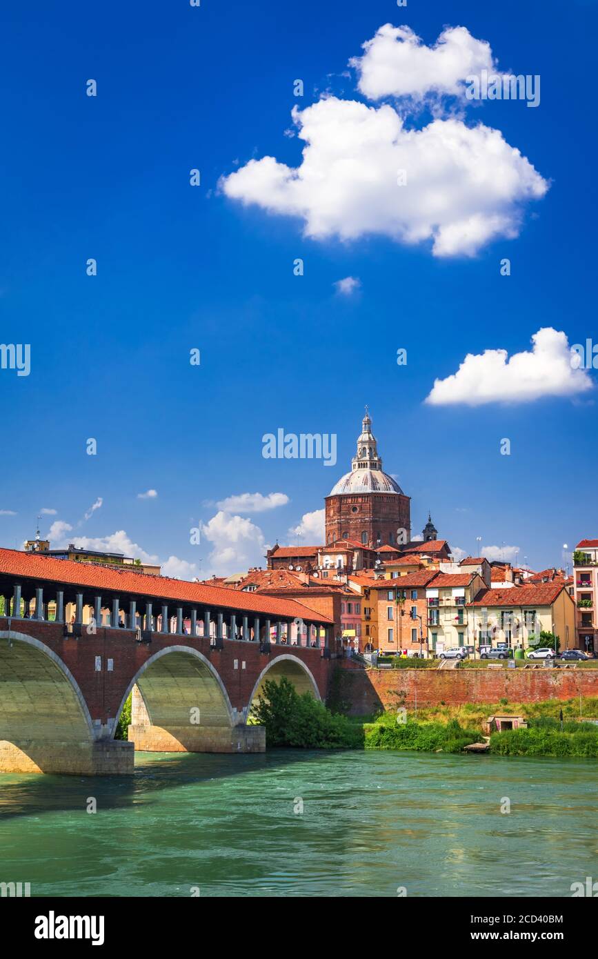 Pavia, medieval Ponte Coperto over Ticino River in northern Italy, historic Lombardy Stock Photo