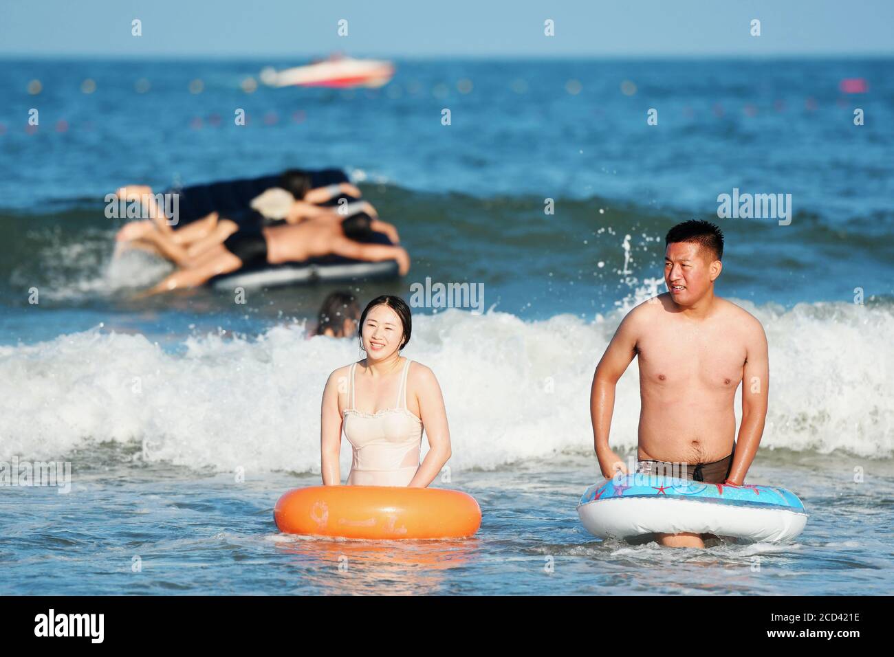 Tourists flock to the Golden Beach, a local oceanic scenic spot, to enjoy aquatic activities to relieve summer heat, West Coast New Area, Qingdao city Stock Photo