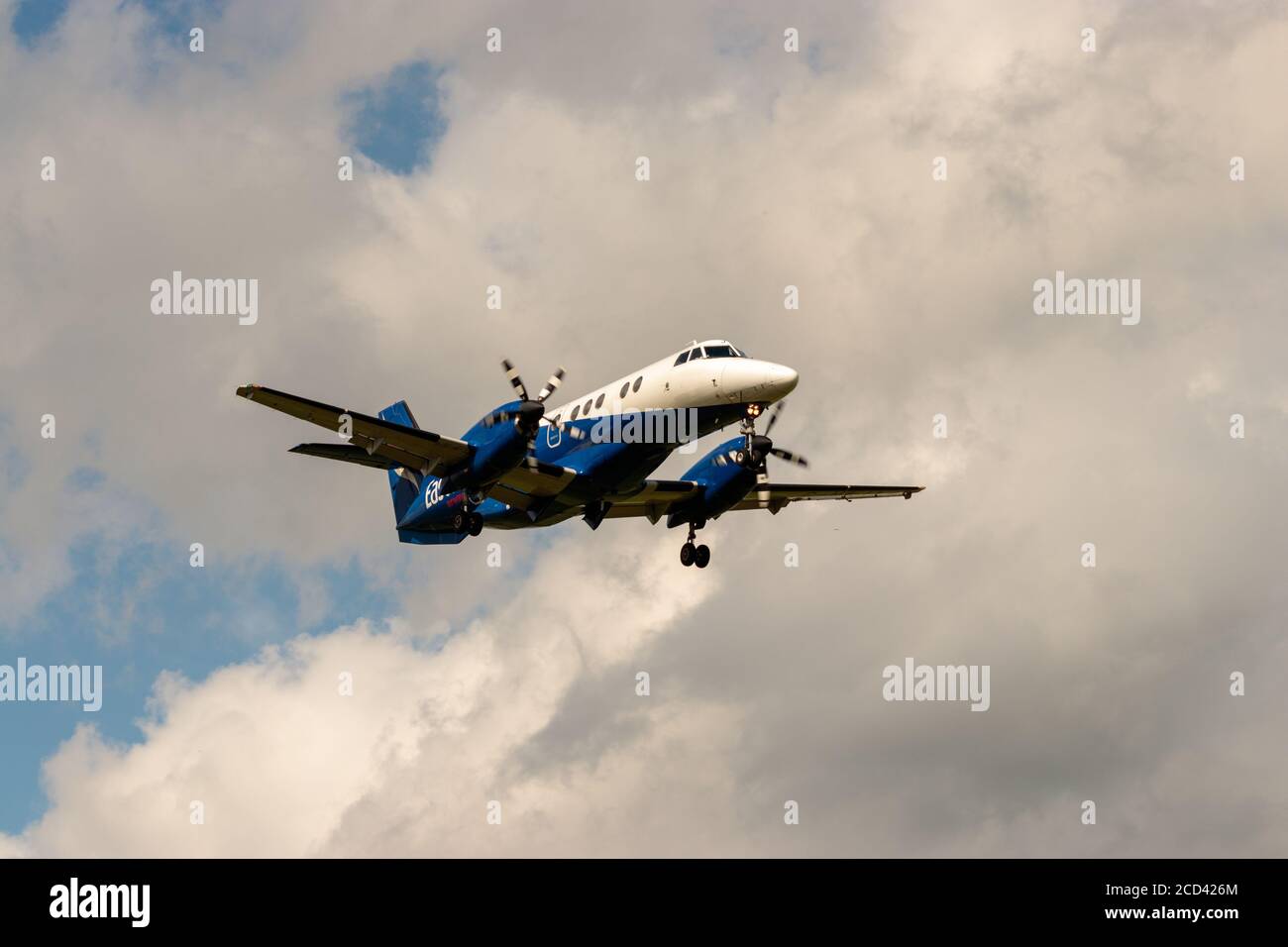 View of Jetstream 41 aircraft, G-MAJA, operated by Eastern Airways, landing at Leeds Bradford Airport Stock Photo