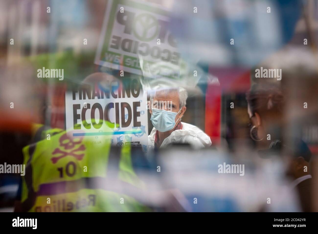 London, UK. 26th August 2020. Extinction Rebellion members protest outside Barclays Bank, Clapham Junction, South London. XR continue their ’Sharklays’ campaign, investigating Barclays Bank for crimes against humanity and the planet. XR state that Barclays is now the biggest European investor in fossil fuels. Credit: Neil Atkinson/Alamy Live News Stock Photo