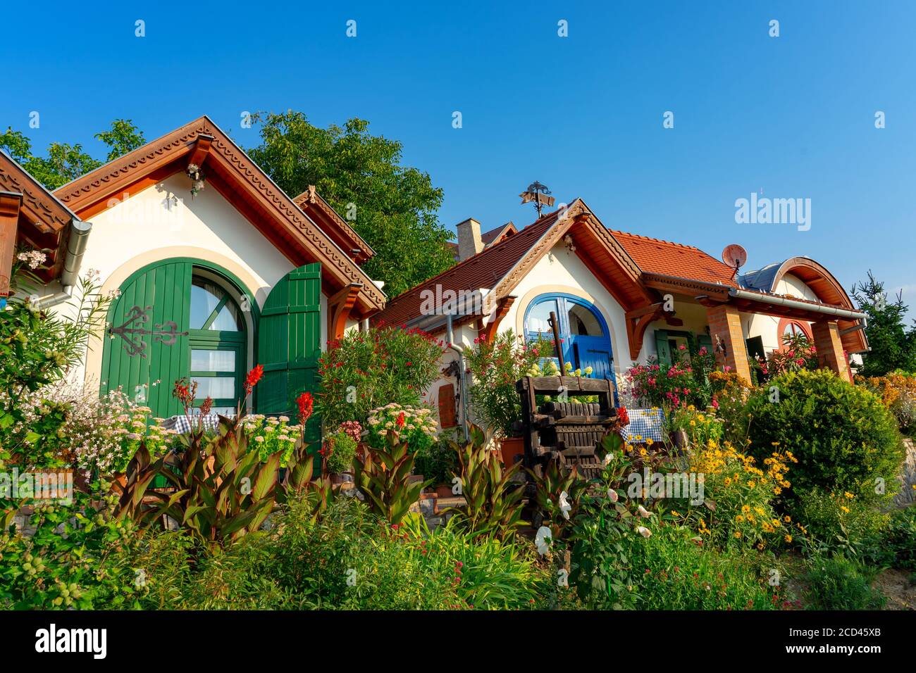 Colorful press-houses little dwarfhouses in pecs Hungary with many flowers Stock Photo